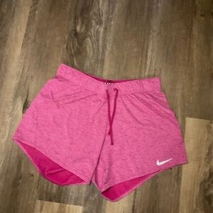 Nike Women's Vibrant Pink Athletic Shorts, size Small